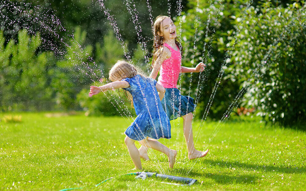kids-running-in-sprinklers-marketplace-health-insurance-wisconsin